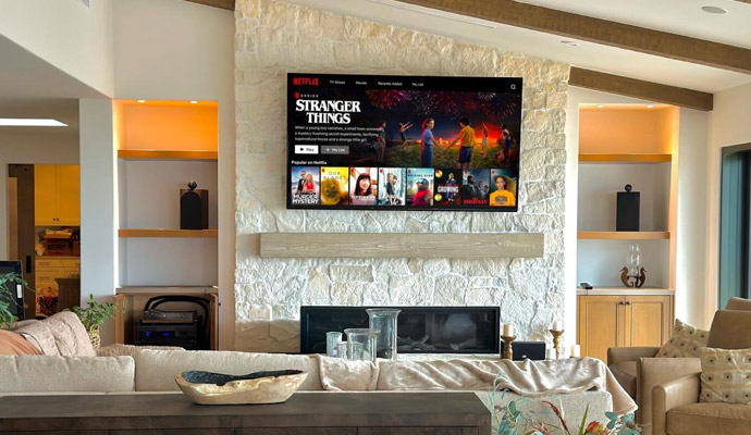 Modern living room with fire place and wall mounted tv