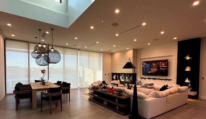 Modern open concept living and dining room with sectional sofa