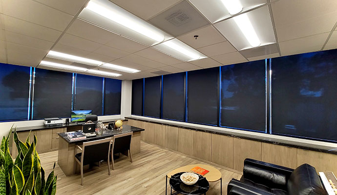 Executive office with marble desk and roller blinds