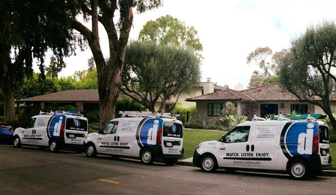 Digital Installers service van fleet parked on residential street