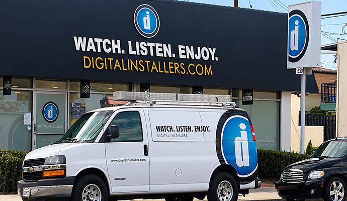 Digital Installers service van outside storefront