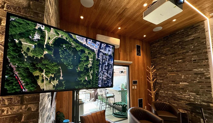 Game room with audio and video entertainment setup