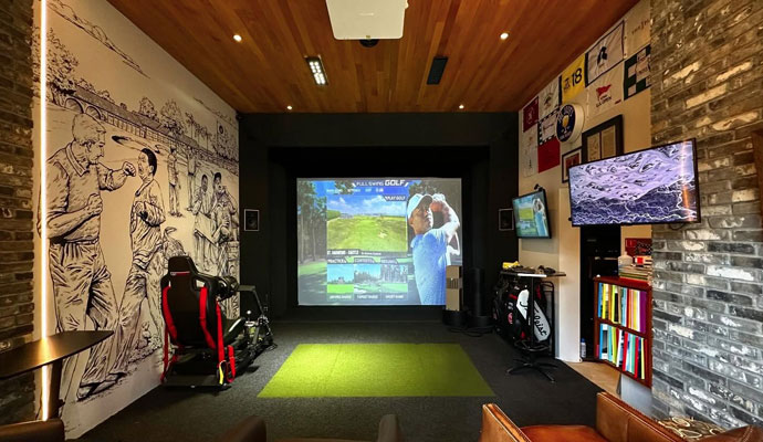 Gaming and entertainment setup with golf simulator screen