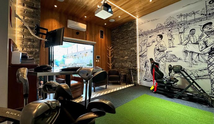 Indoor golf simulator room