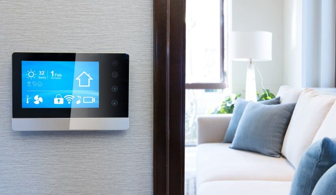 Installed climate control device on living room wall