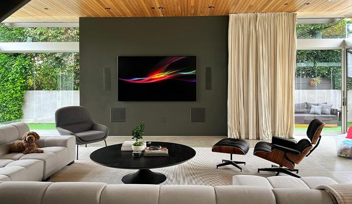 Living room with in wall audio system