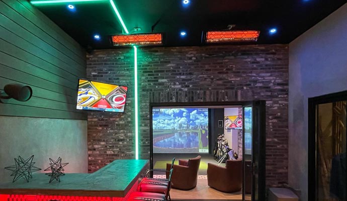 Modern indoor golf simulator room