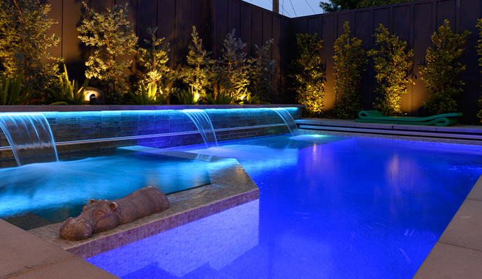 Modern swimming pool with smart lighting