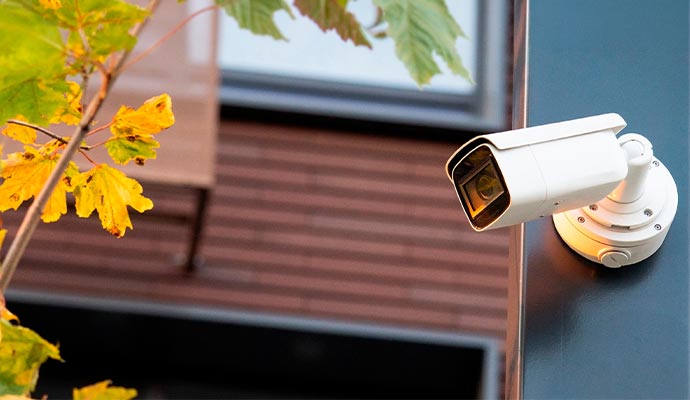 Outdoor security camera on building
