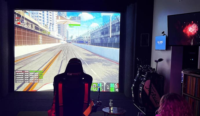Racing simulator setup with a large screen
