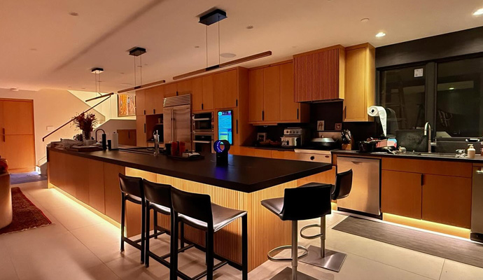 Kitchen island with warm white linear LED lighting