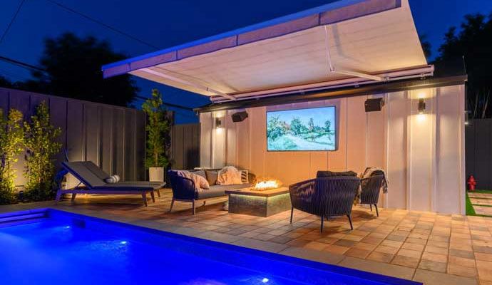 Installed modern outdoor lighting system near the pool