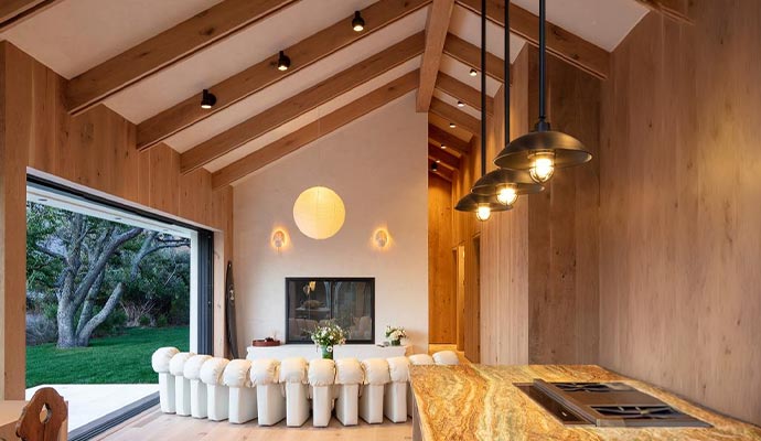 Open concept living room with sliding glass wall