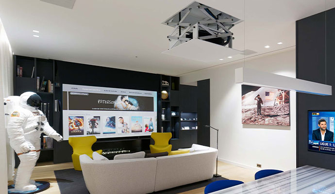 Living room featuring projector lift system