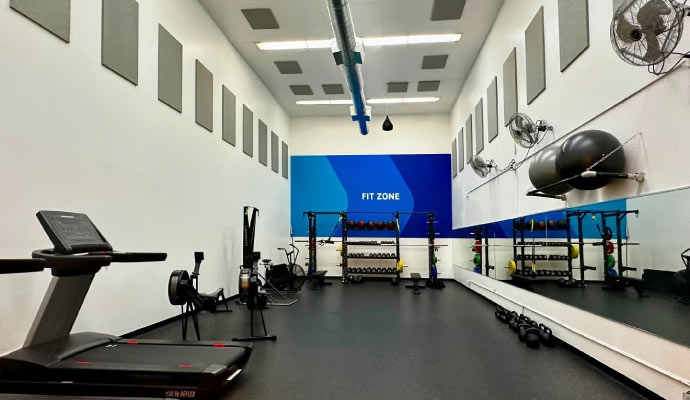 Modern fitness room equipped with exercise machines