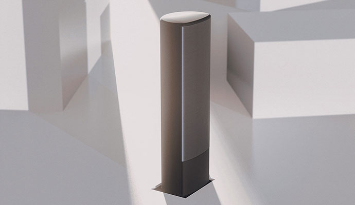 A motorized pop-up floor speaker