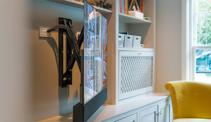Motorized TV mount with flat-screen television