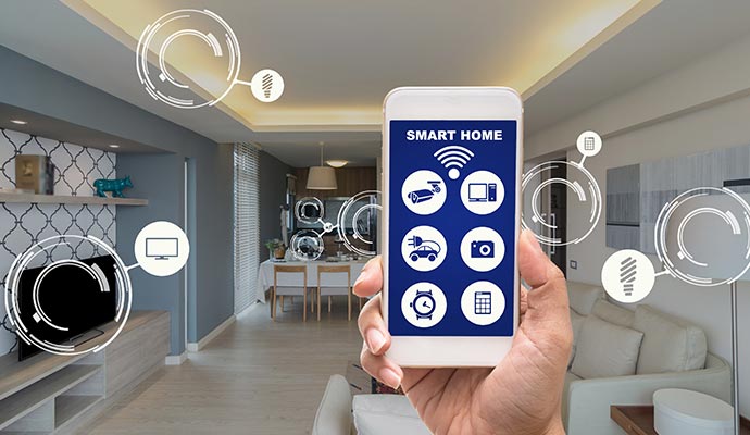 Person holding a smartphone with smart home app interface