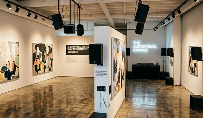 Professional sound system and ambient lighting installed in a modern art gallery