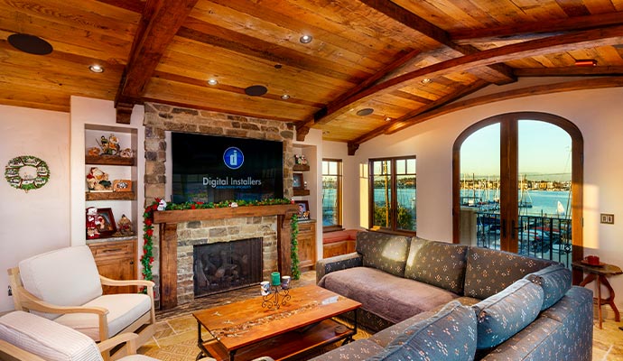 Rustic living room featuring a wall-mounted high-end audio and video system for entertainment