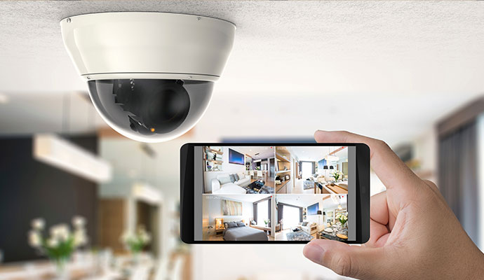Checking security camera footage on smartphone