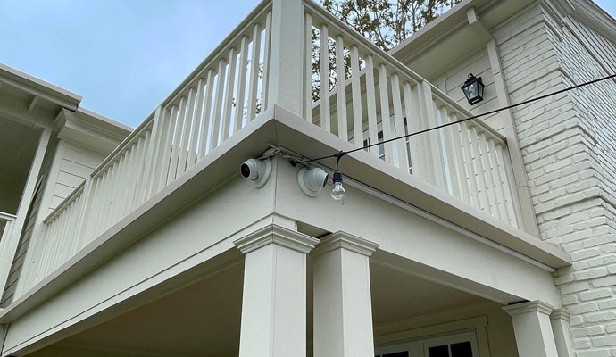 Outdoor security cameras installed under balcony