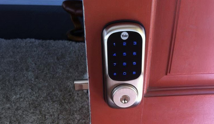 Smart electronic keypad lock on front door