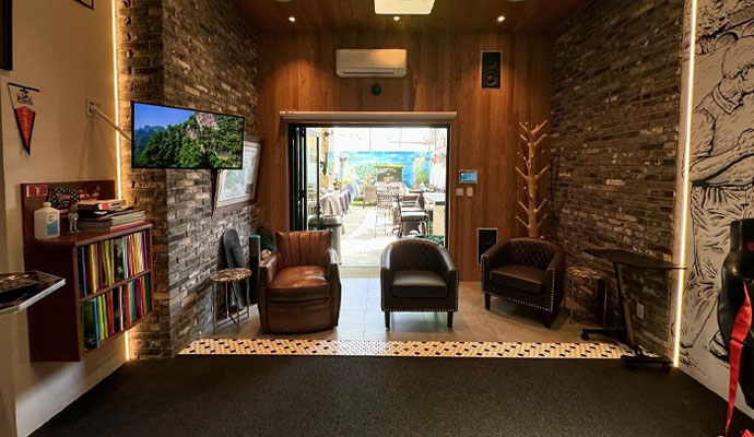 Stylish game room lounge with comfortable leather chairs